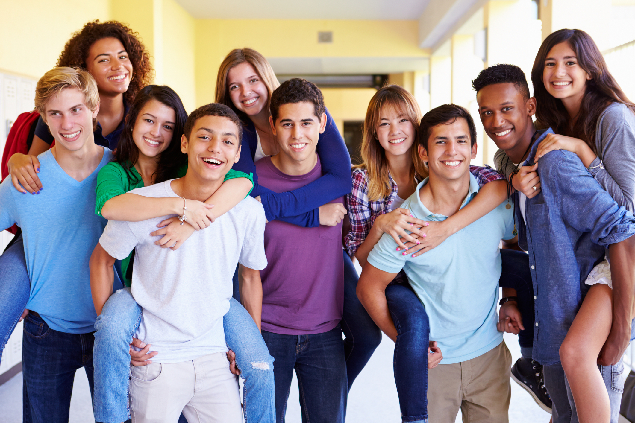 http://www.dreamstime.com/stock-images-group-high-school-students-giving-piggybacks-corridor-close-up-image-smiling-image41525284
